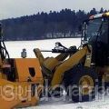 Snow thrower for snow throwing on backhoe loader from Russia